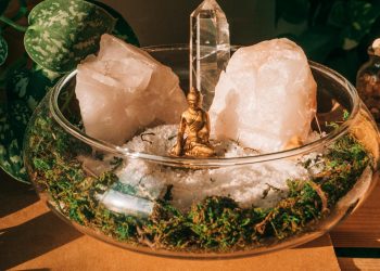 Buddha and Crystals on Clear Glass Bowl