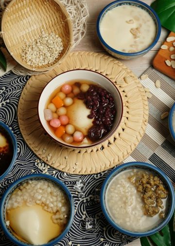 Top View of Traditional Dishes in Bowls on Table